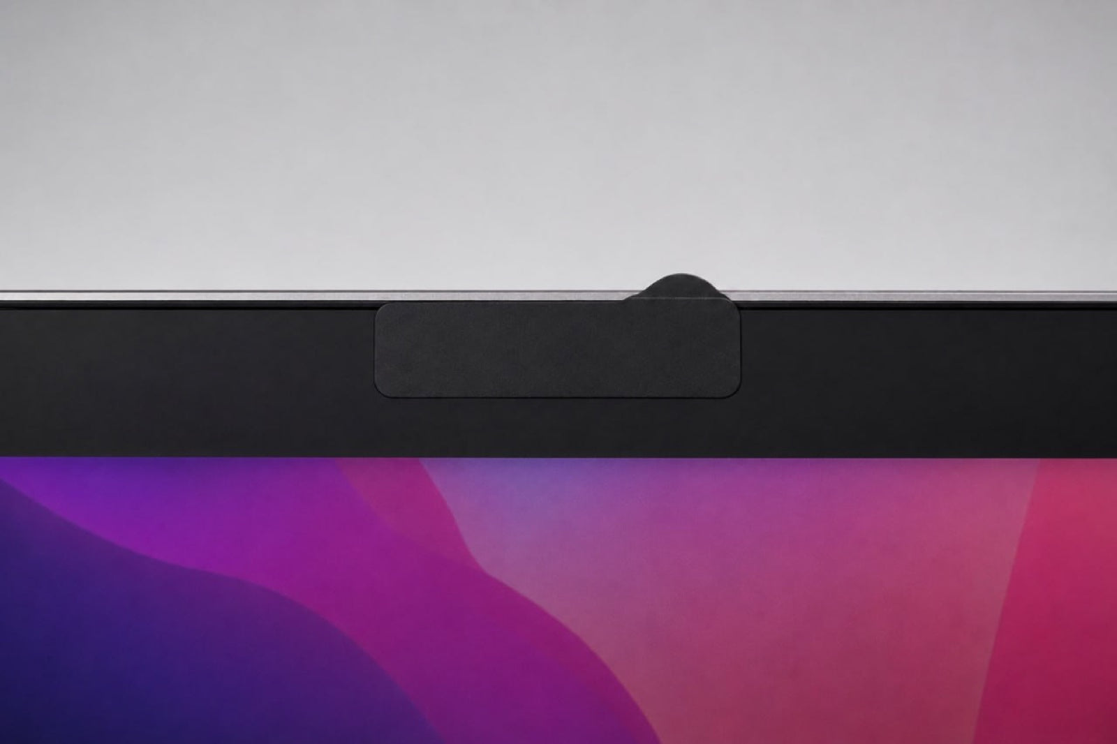 Slate cover applied over the MacBook camera