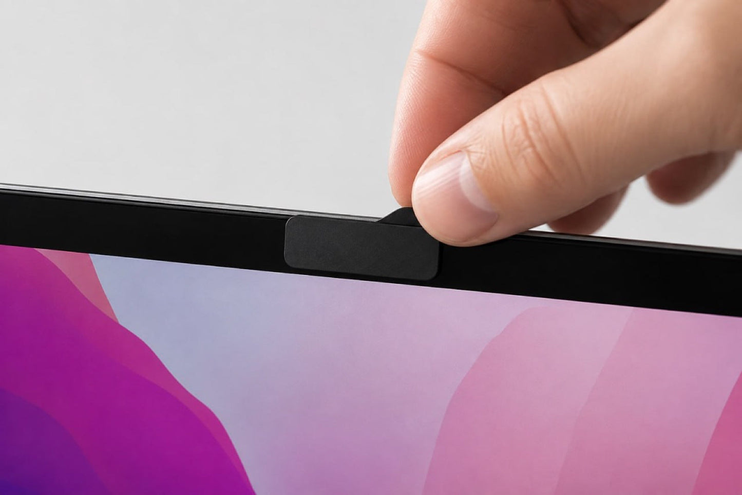 Lifting the 1.2 mm tab with a fingernail