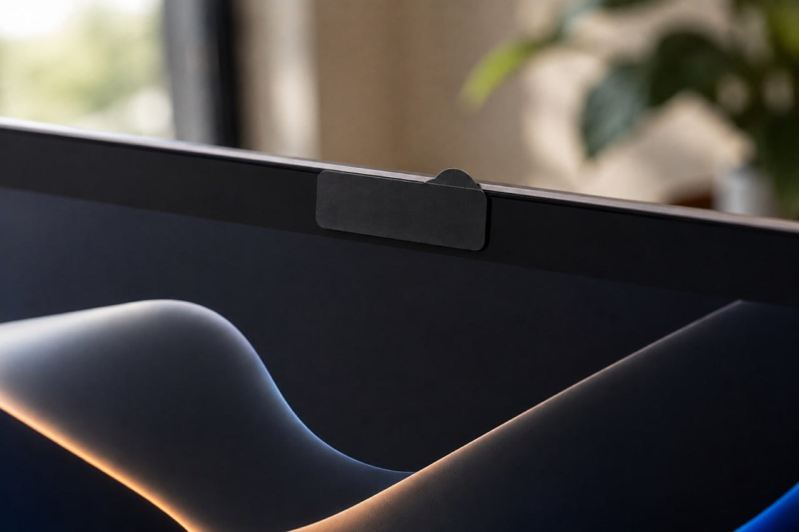 Slate cover applied over the MacBook camera